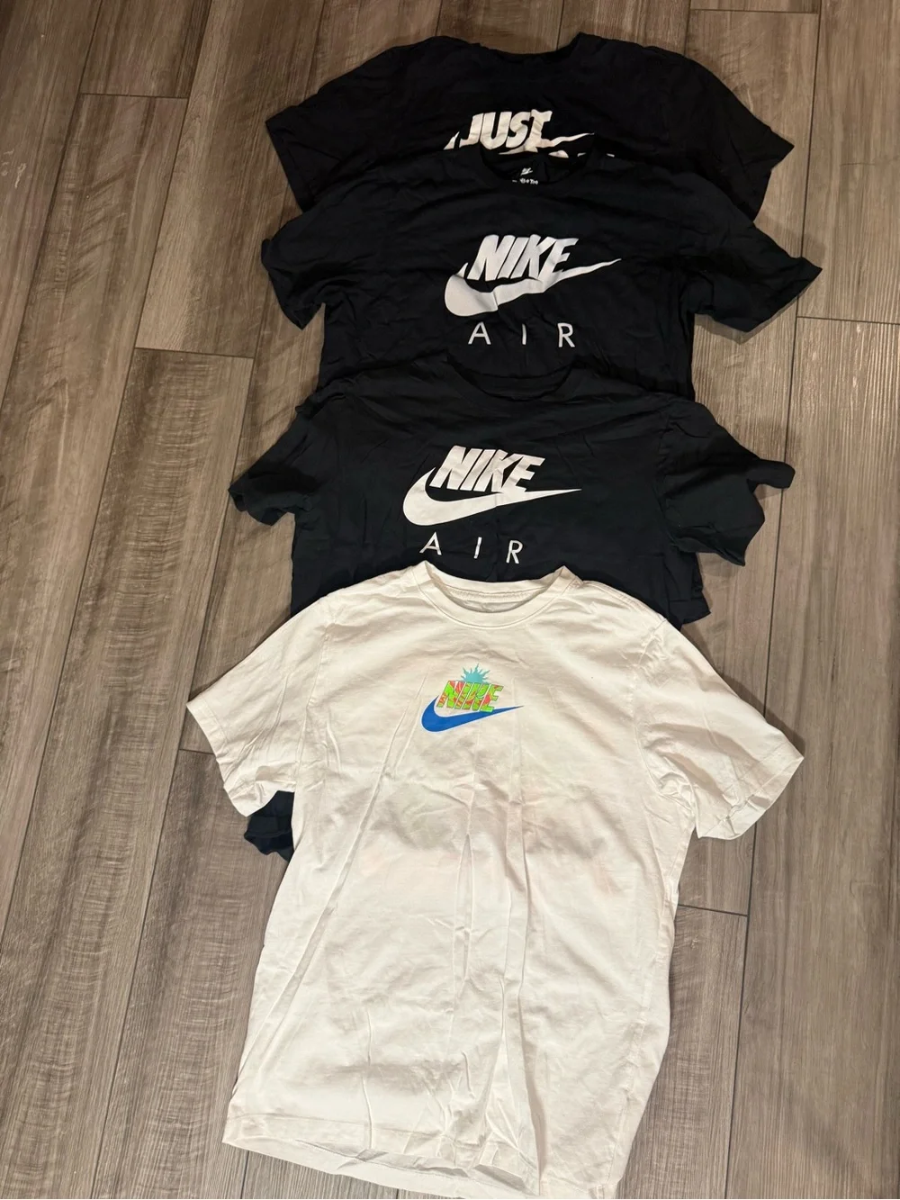 Nike Kids Short-Sleeve Graphic Tees — Black & White with Multicolor Logo